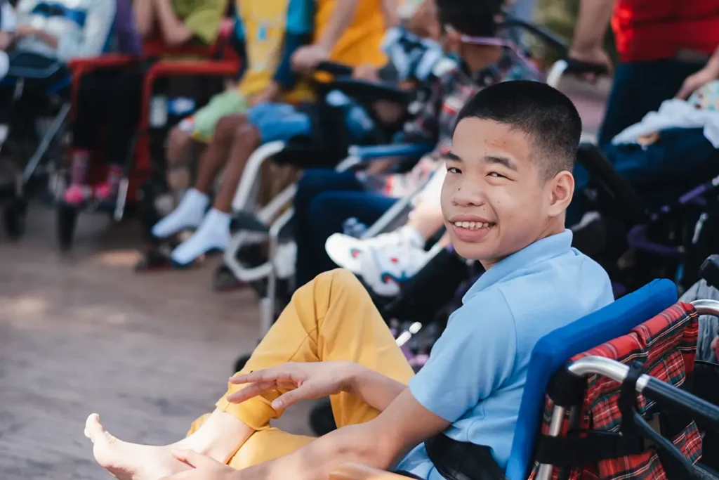 A young individual at a disaibled youth session