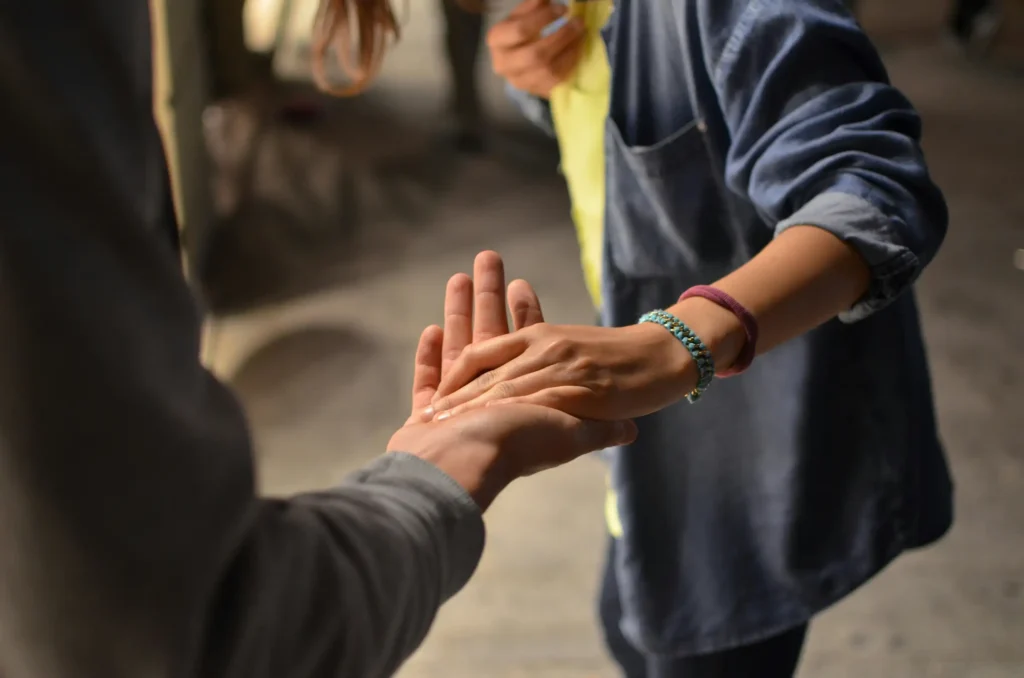 Persons shaking hands