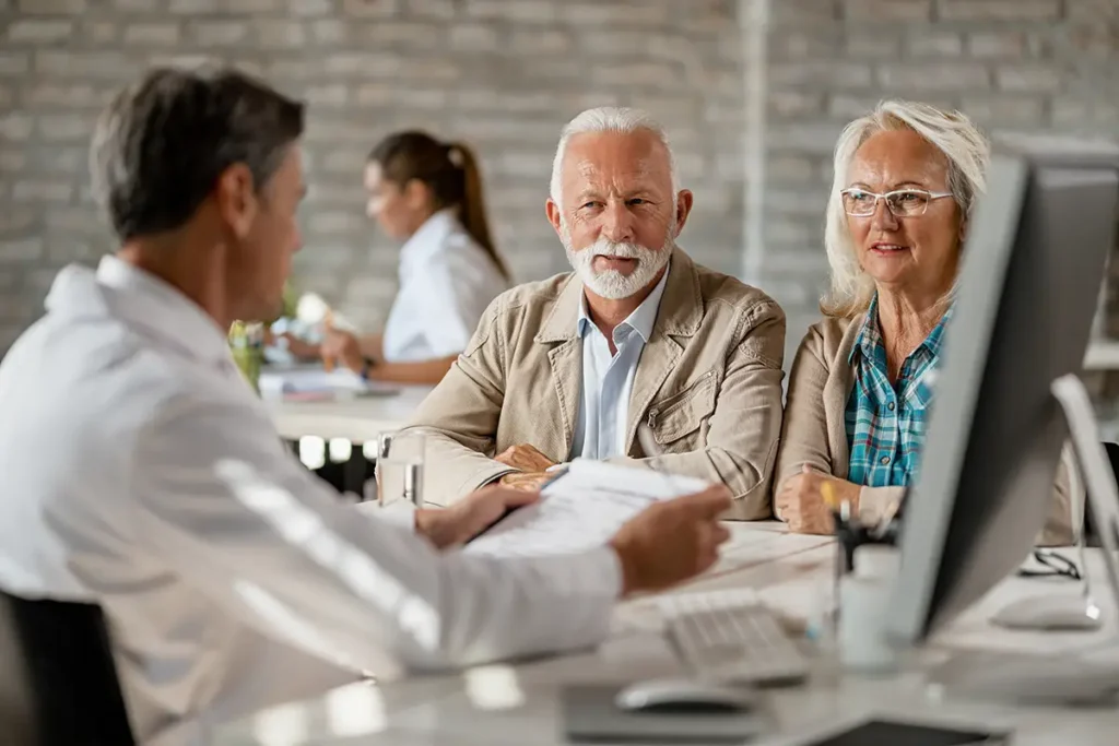 An older couple consulting a doctor